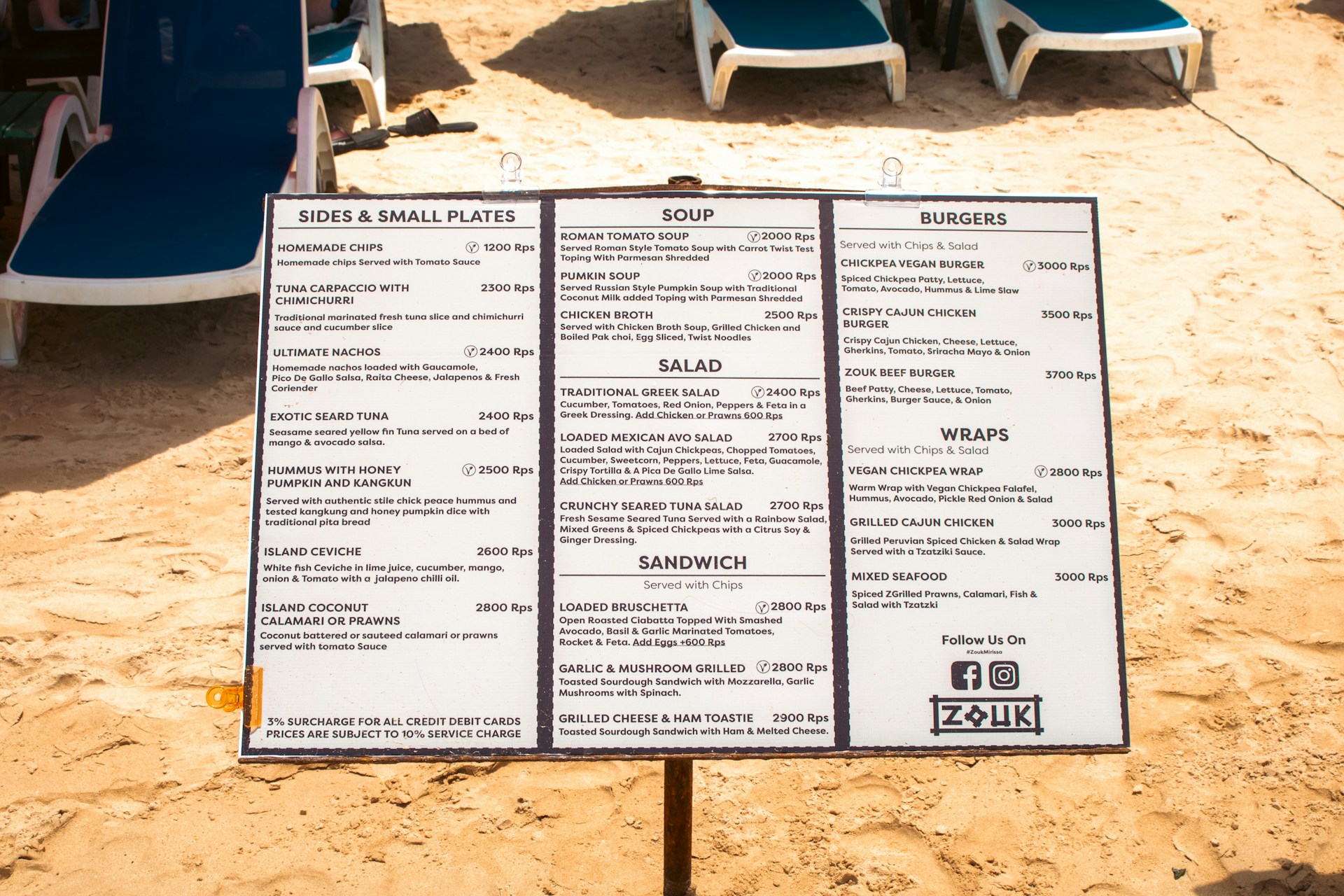 QR code menu being scanned by customer at restaurant table